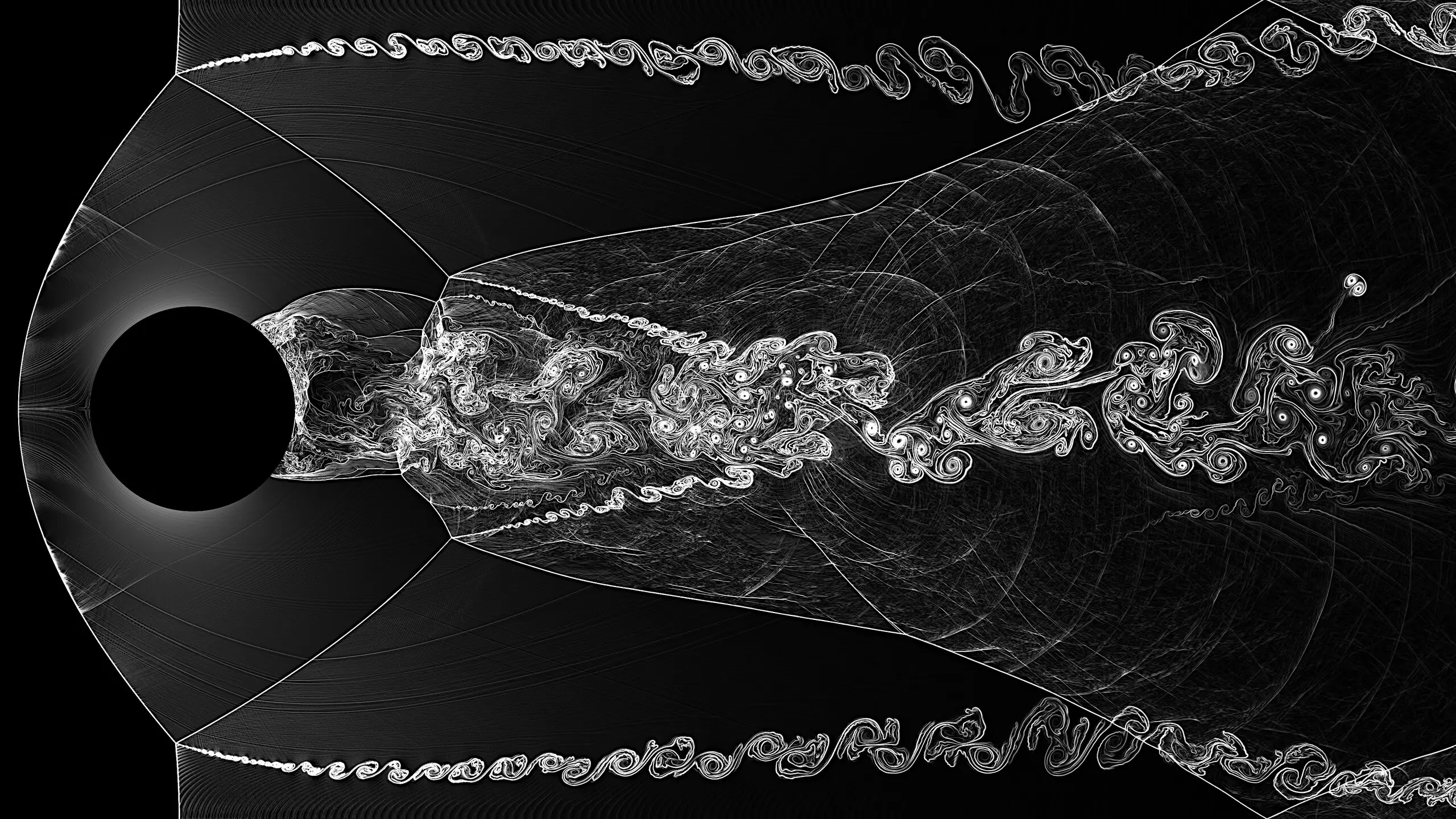 Schlieren rendering of supersonic flow past a cylinder: a bow shock, two shear layers, and a turbulent vortex wake